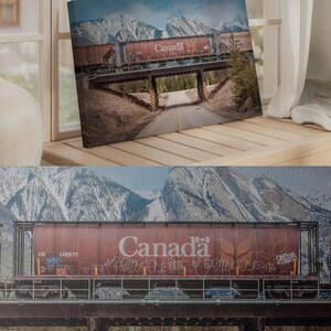 a picture of a train going over a bridge