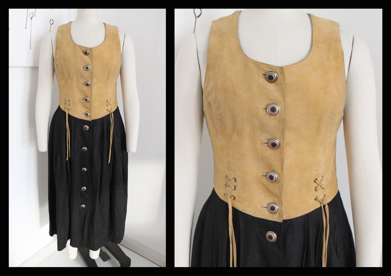 Pu&ograve; includere: Un abito vintage in pelle scamosciata e nero con chiusura a bottoni sul davanti e un dettaglio di pizzo in vita.
