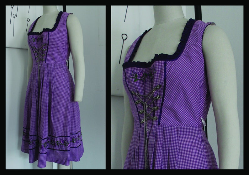 May include: A sleeveless purple gingham dress with a square neckline and a fitted bodice. The bodice features a decorative metal closure and embroidered floral accents. The hemline is adorned with embroidered floral details.