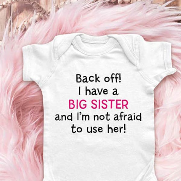 Back off! I have a BIG SISTER and I'm not afraid to use her. funny baby Infant Bodysuit Baby shower gift surprise pregnancy toddler shirt