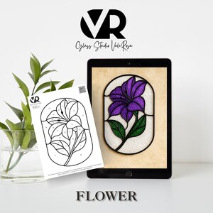 May include: A digital stained glass design of a purple flower with green leaves displayed on a tablet. A printed black and white line drawing of the flower is next to the tablet. The word "FLOWER" is at the bottom of the image.