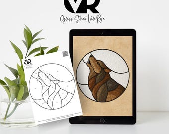 May include: A digital tablet shows a stained glass wolf design in brown and tan shades, framed by a white circle. A printed pattern of the same wolf design is beside the tablet. The word "WOLF" is at the bottom.