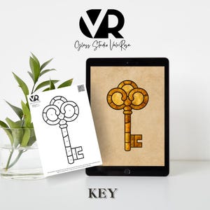 May include: A digital illustration of a golden key displayed on a tablet, next to a black and white line drawing of the same key. The word "KEY" is at the bottom of the image. The logo "VR" is at the top.