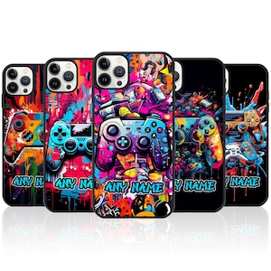 May include: Five phone cases with a colourful graffiti design featuring video game controllers. The cases have a black background with bright colours and the text "ANY NAME" on the bottom.