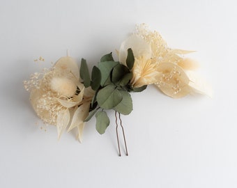 Accessoire cheveux Pique à chignon en fleurs séchées stabilisées pour mariage et évèvenement.