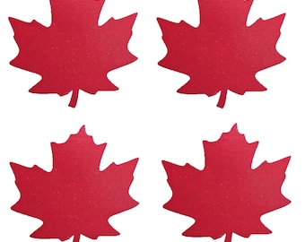 Puede incluir: Cuatro recortes de hojas de arce de fieltro rojo. Las hojas son un símbolo canadiense clásico.