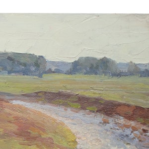 May include: A painting depicting a landscape with a meandering river in the foreground. The river is pale blue and the banks are a combination of brown, green, and yellow. The background is a hazy blue with a line of trees in the distance.