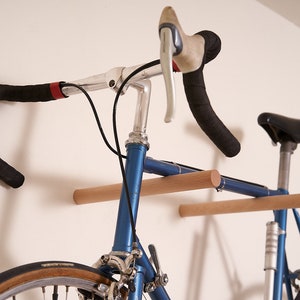 The BOTL Amsterdam #3 are two bike hooks that allow you to mount your bike on the wall. It has a minimalistic design and saves you space.