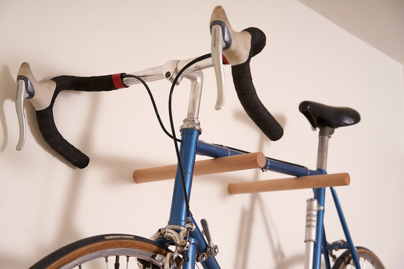 The BOTL Amsterdam #3 are two bike hooks that allow you to mount your bike on the wall. It has a minimalistic design and saves you space.