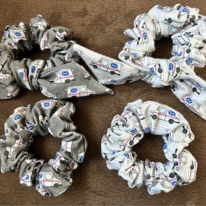 Postal scrunchy hair ties mail carrier