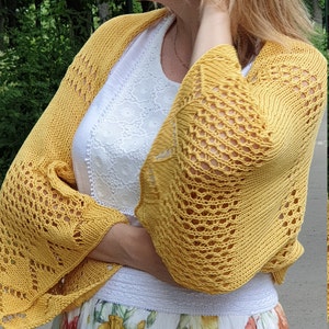 Knitted pattern of yellow summer cardigan cover up with cotton lace for women