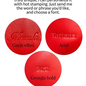 May include: Red leather circles with embossed text, demonstrating personalisation options. The circles display names and initials in various fonts, including "Virmala" and "Tatiana". The text "Personalisation option" is at the top.