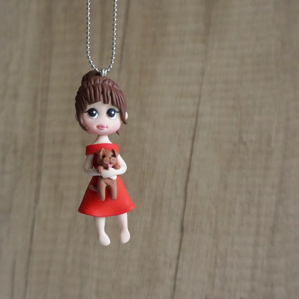Girl with a puppy pendant, Polymer clay doll necklace, Personalized gift for dog lovers, Girl holding a dog handmade figure