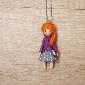 Polymer clay fall fashion doll necklace, Girl with autumn outfit holding a book, Polymer clay jewelry, Polymer clay miniature image 1