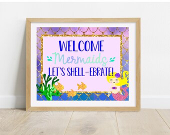 May include: A printable sign with a mermaid theme. The sign is pink with a gold glitter border and says "Welcome Mermaids Let's Shell-ebrate!" with a cartoon mermaid illustration.