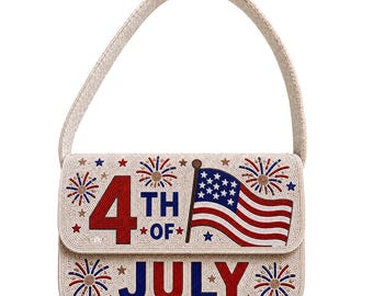 May include: Beaded handbag with a cream-colored background. The design features the text "4th of July" in red and blue, along with an American flag and fireworks. The bag has a matching handle.
