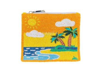 May include: A beaded orange coin purse with a tropical beach scene. The design includes a yellow sun, white clouds, palm trees, blue water, and a sandy beach. The purse has a silver zipper.