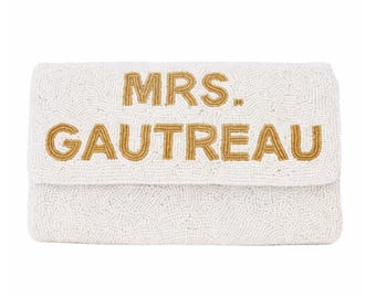 May include: A rustic wooden sign with the text "Welcome to our home" in white lettering. The sign features a distressed finish and a simple, inviting design, perfect for a front porch or entryway.