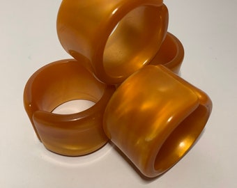 Anéis de guardanapo retrô MCM de plástico grosso laranja/dourado - conjunto de (4)