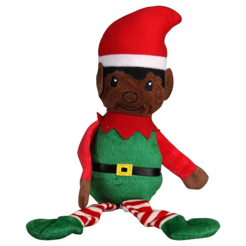 May include: A festive plush elf doll, featuring a red hat and sleeves, and a green tunic with a gold buckle. The elf has brown skin and striped red and white legs. The elf's face has a happy expression.