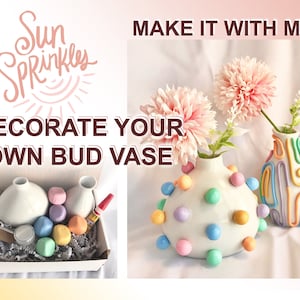 May include: A DIY kit to decorate your own bud vase. The kit includes two white ceramic vases, pastel coloured clay balls, glue, and a small container of glitter. The image also shows two decorated vases, one with pastel coloured clay balls and the other with pastel coloured lines.