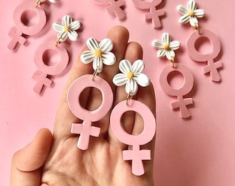 female gender symbol earrings