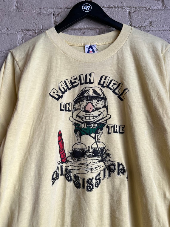 Medium, 1980s Raisin Hell T-shirt, Yellow, Mississ