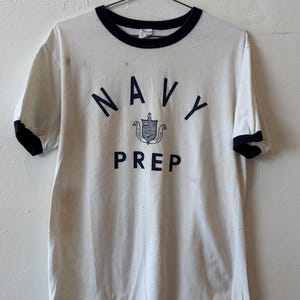 Vintage 80's Champion Navy Prep Military Ringer White Graphic T Shirt Extra Large