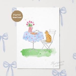 May include: A watercolor illustration featuring a ginger tabby cat sitting on a white metal chair next to a round table with a blue floral tablecloth. On the table sits a red and white striped pitcher with pink tulips, a book, and a teacup.