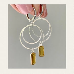 Silver hoops with citrine pendants