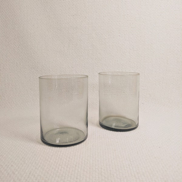 A pair of cute retro smoked glass tumblers, bohemian eco living natural materials eclectic sustainable zero waste home decor mcm