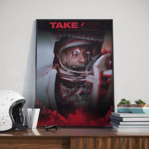 Puede incluir: Un p&oacute;ster en blanco y negro con la palabra "TAKEOFF" en letras rojas. El p&oacute;ster presenta un primer plano de un astronauta con un casco, con un fondo rojo y blanco.
