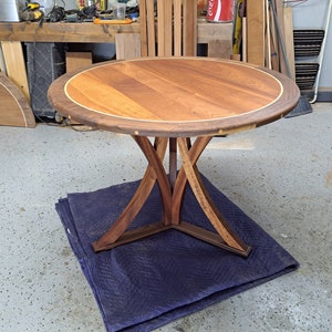 48" Circle Dinning Table w/ 12" leaf extension
