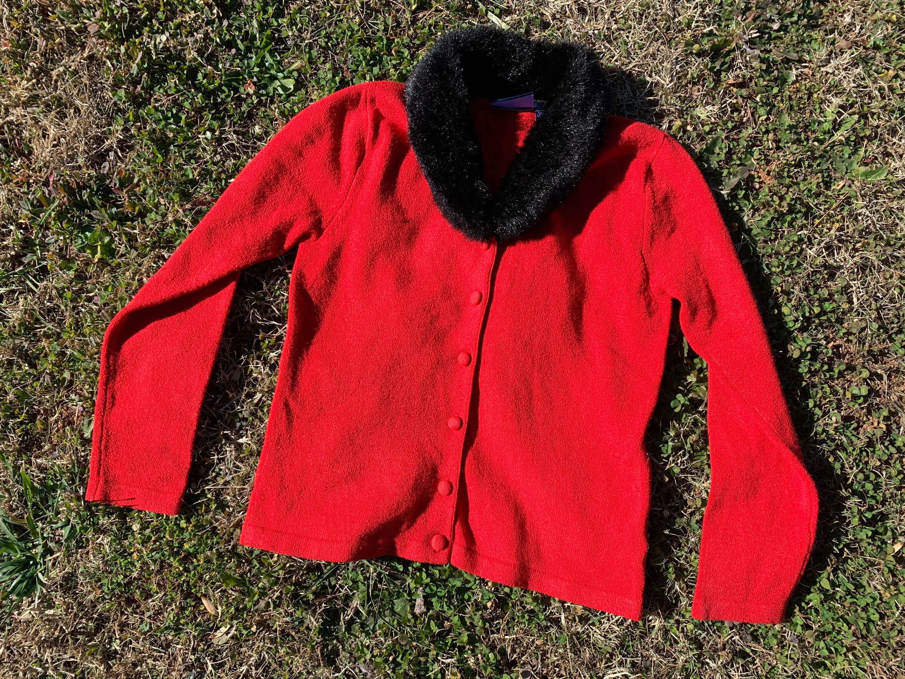 womens red sweater with white fur trim