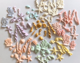 Gorgeous Gold and Pastel shaded corals and sea shells. 40 edible pieces of coral/shells, for mermaid cakes and more. (Please see description