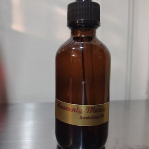 Zalfolie Hemelse Barmhartigheid 2oz in Amber Mockins Glazen Fles met Druppelaar