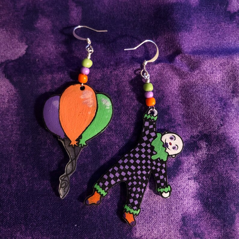 CLOWNIN\u2019 AROUND TOWN hand painted mismatched clown earrings