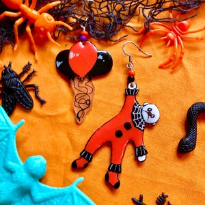 CLOWNIN\u2019 AROUND TOWN hand painted mismatched clown earrings