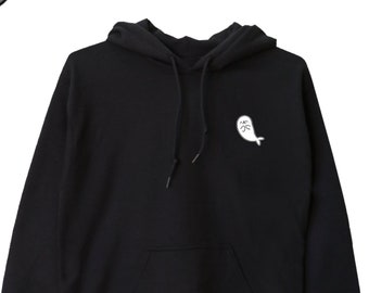 May include: Black hooded sweatshirt with a white seal graphic on the front.