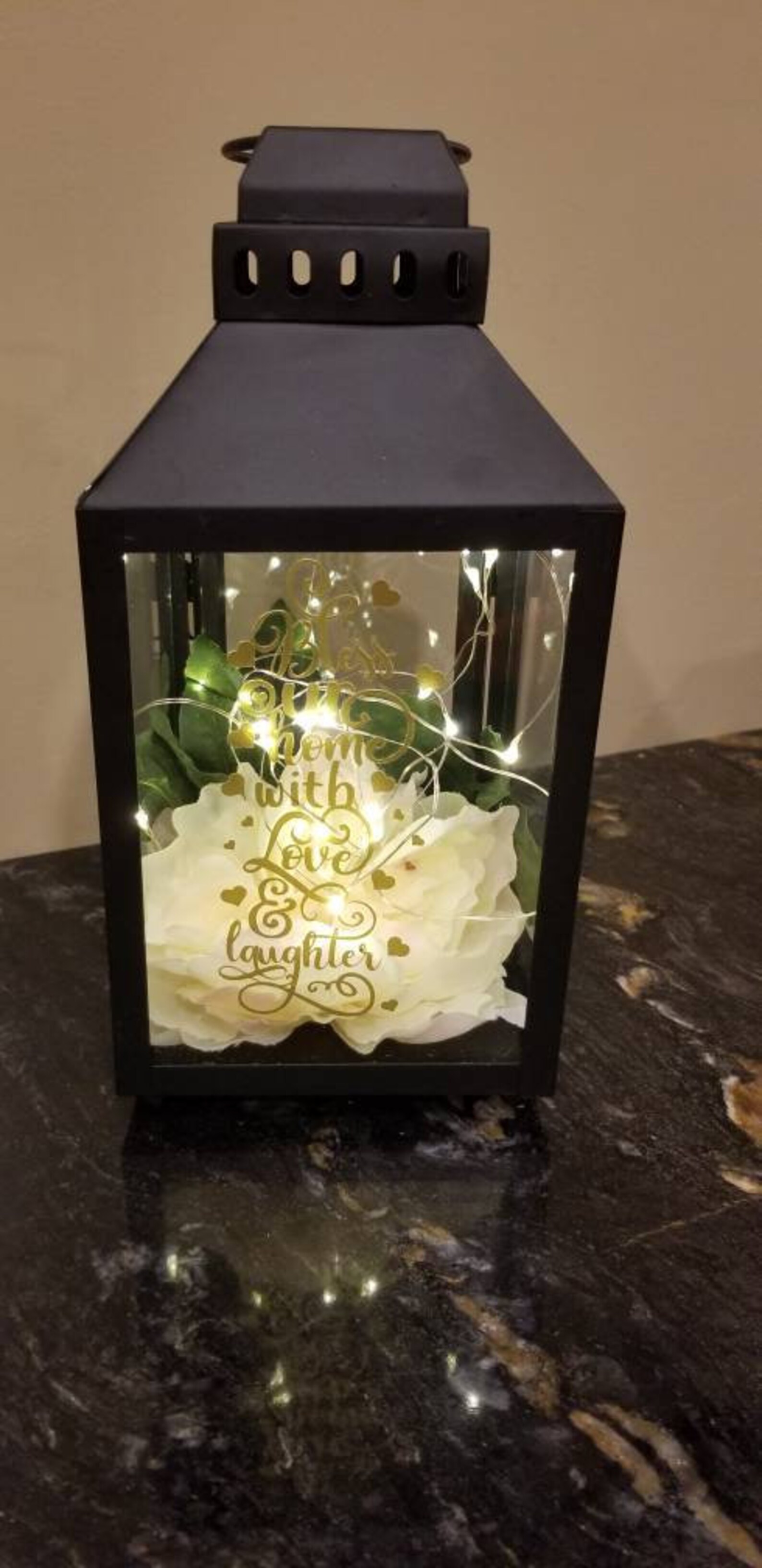 Lantern Centerpiece with Fairy lights with floral decor on the Etsy