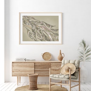 May include: A framed print of a stylized abstract design featuring a flowing pattern of green and brown leaves on a light green background.