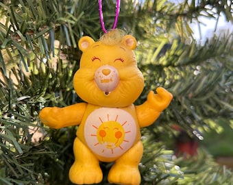 Funshine bear. Christmas Ornaments. Care Bear Ornament. Care Bear Figure. 80s toy. 80s child. Care Bears. Care bear figure. Yellow care bear