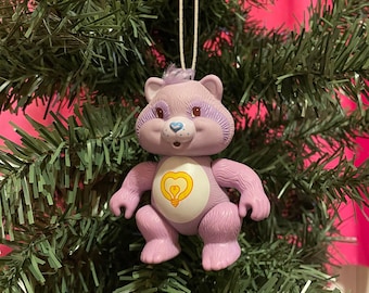 Bright heart raccoon. Christmas Ornaments. Care Bear Ornament. Care Bear Figure. 80s toy. 80s child. Care Bears. Care bear cousins.