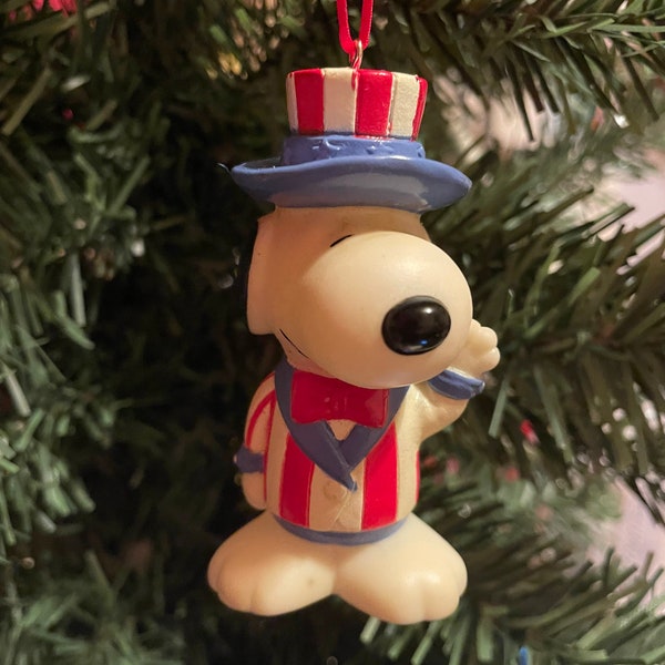 ETATS-UNIS. NOUS. Les états-unis d'Amérique. Snoopy. Snoopy dans le monde entier. Décoration d'arbre de Noël. Décoration d'arbre de Noël. Jouet recyclé. Jouet rare