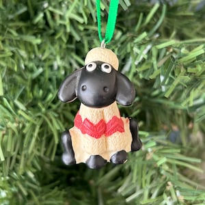 Shaun the sheep. Wallace and Gromit. 1989. Christmas decoration. Kitsch Christmas decoration. Kitschmas. Christmas tree decoration.
