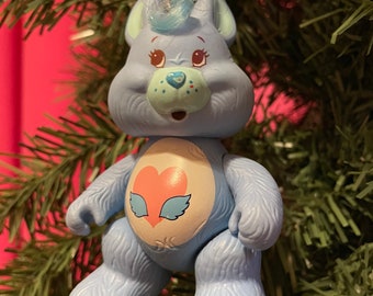 Swift heart rabbit. Christmas Ornaments. Care Bear Ornament. Care Bear Figure. 80s toy. 80s child. Care Bears. Care bear cousins.