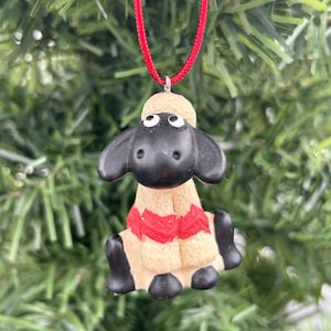 Shaun the sheep. Wallace and Gromit. 1989. Christmas decoration. Kitsch Christmas decoration. Kitschmas. Christmas tree decoration.