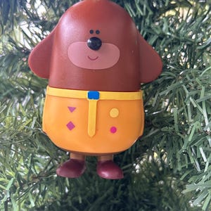 Hey Duggee. Duggee. Christmas decoration. Distinctive decoration. Christmas tree decoration. Christmas. TV character. Kitschmas. CBeebies.