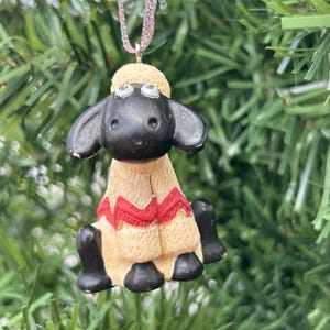 Shaun the sheep. Wallace and Gromit. 1989. Christmas decoration. Kitsch Christmas decoration. Kitschmas. Christmas tree decoration.