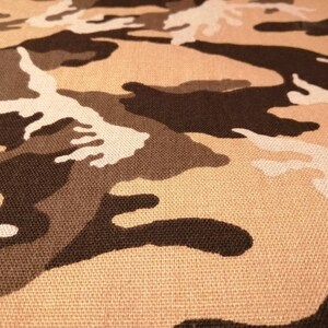 Solid cotton fabric with camouflage pattern beige